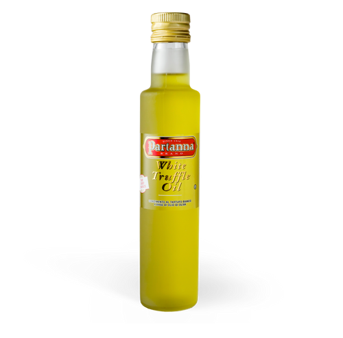 A bottle of Partanna White Truffle Olive Oil with a yellow label on a white background.