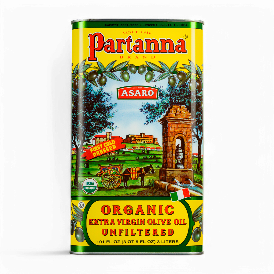 A yellow tin can of Partanna Sicilian Organic Unfiltered Extra Virgin Olive Oil with an illustration of olive trees and a landscape in the background.