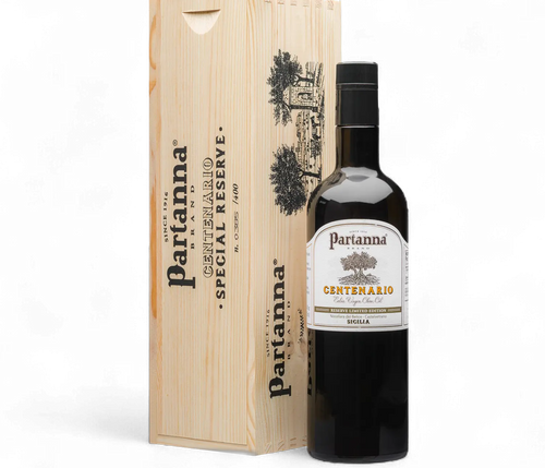 Partanna olive oil bottle with wooden box on a white background
