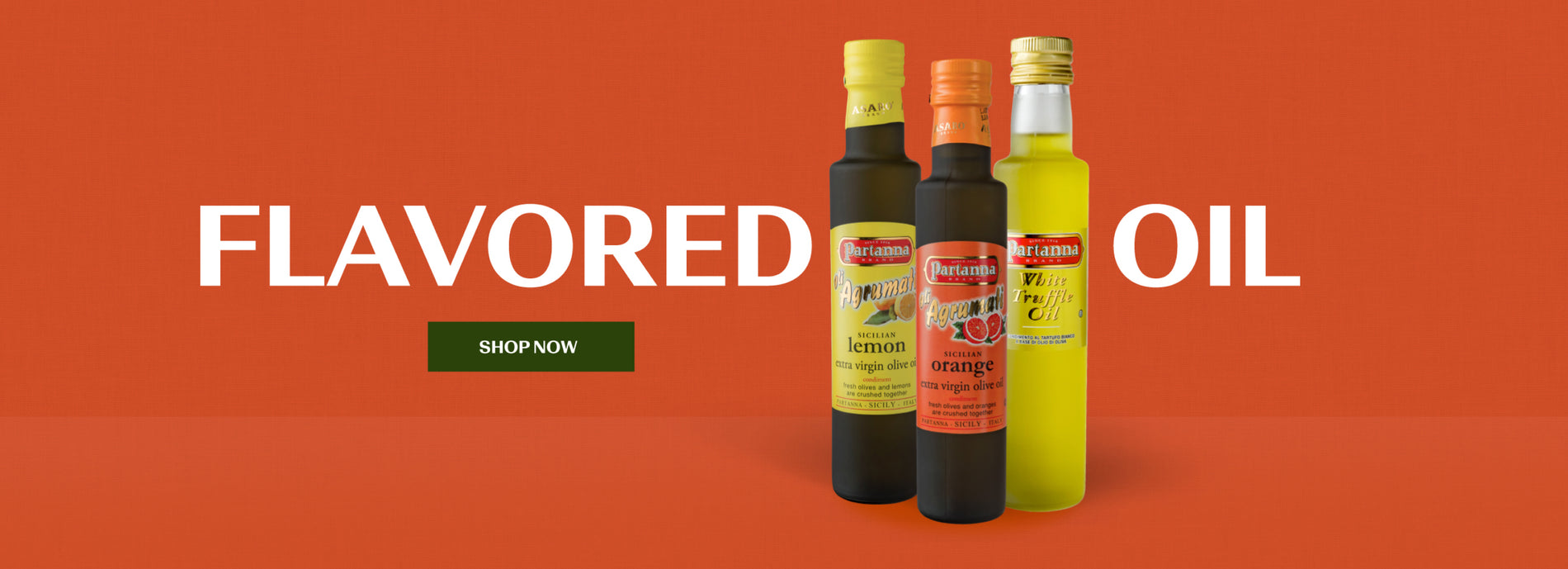 Three bottles of Partanna flavored olive oils arranged in front of an orange background