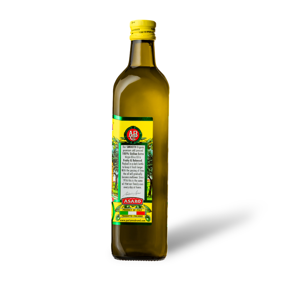 A side view of a bottle of Partanna olive oil. 