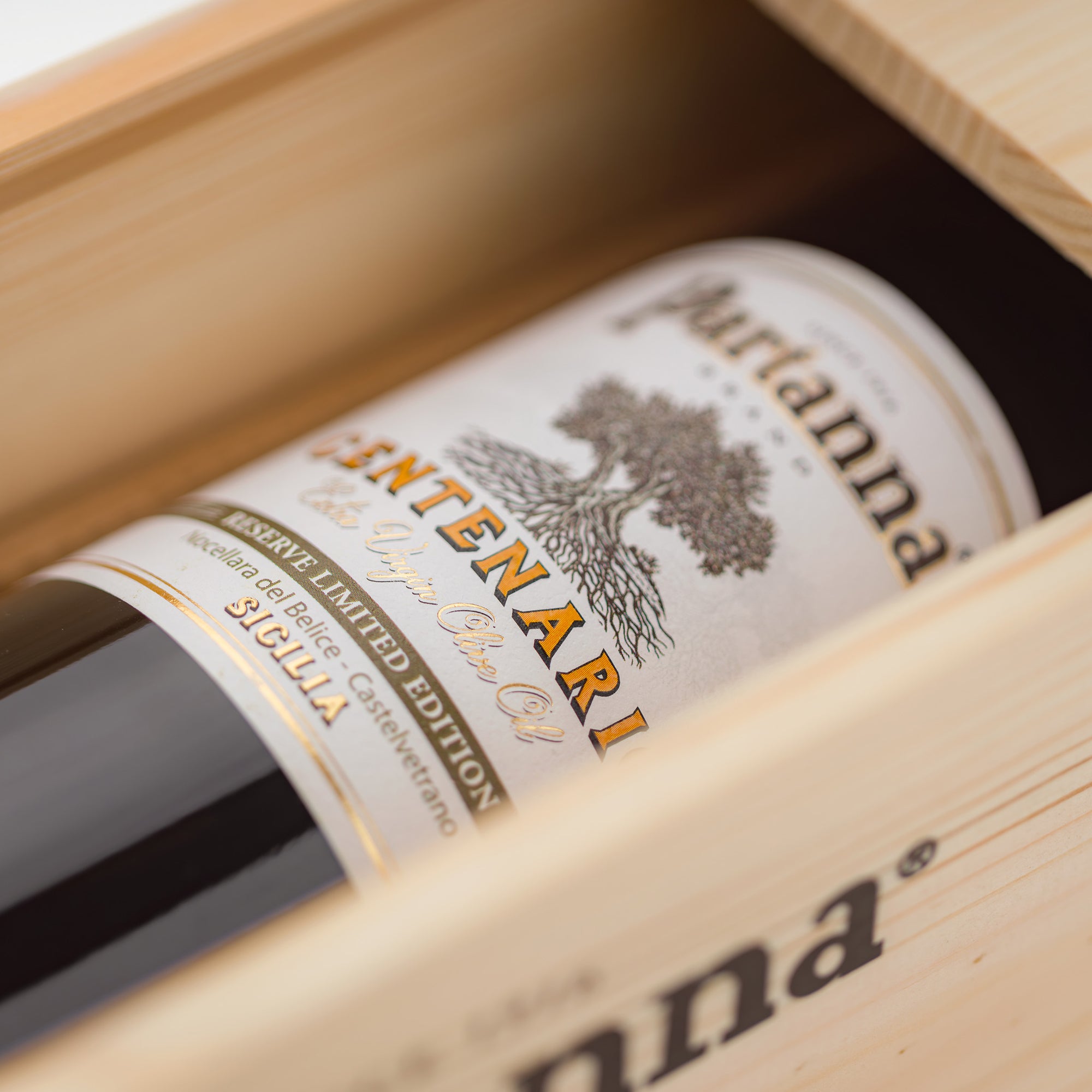 Wine bottle with 'Antinori' label in a wooden box