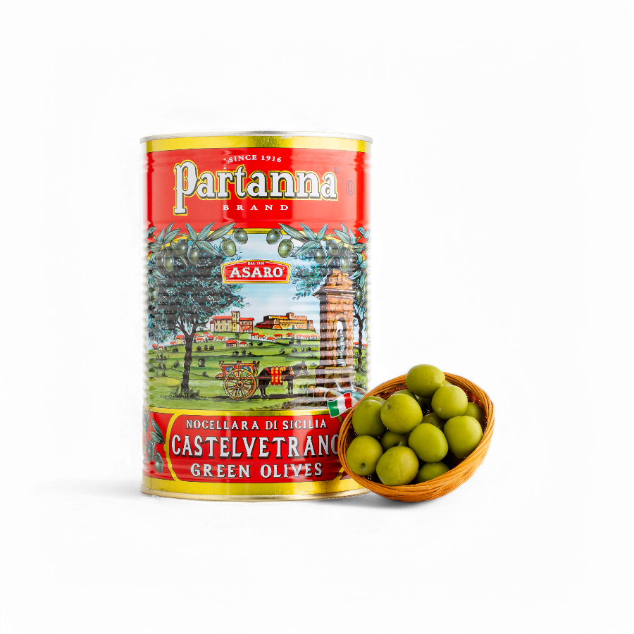 A can of Partanna whole Castelvetrano green olives with a small basket of olives in front of it.