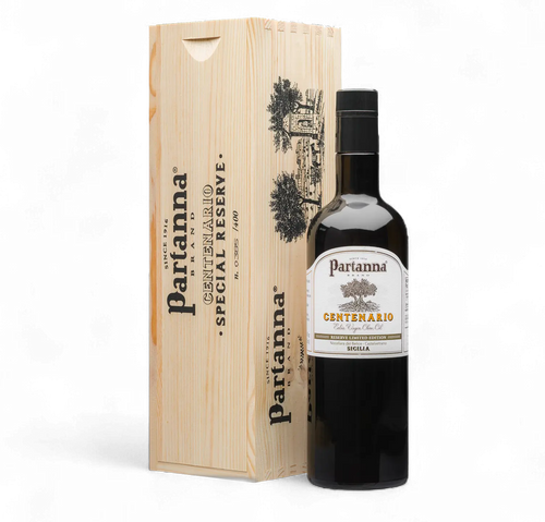 Partanna olive oil bottle with wooden box on a white background