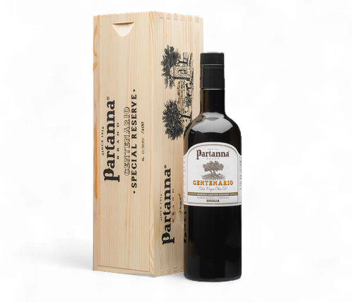 Partanna olive oil bottle with wooden box on a white background